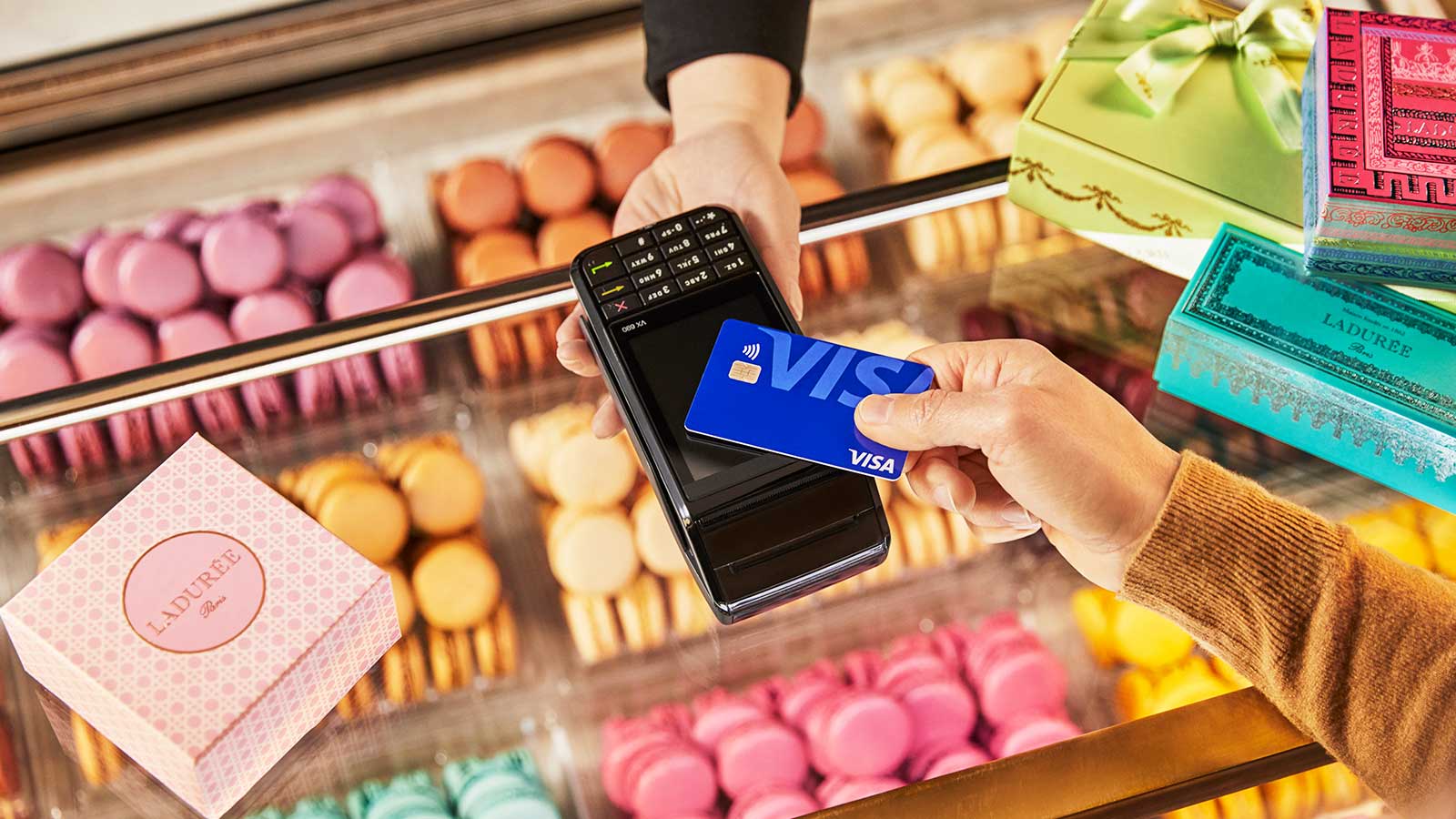 Customer at bakery using contactless payment